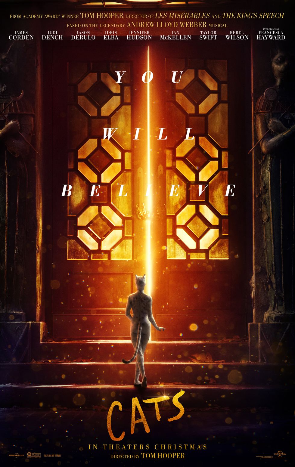 A poster for the Cats movie. A gray, small cat is walk up steps to a giant set of doors.