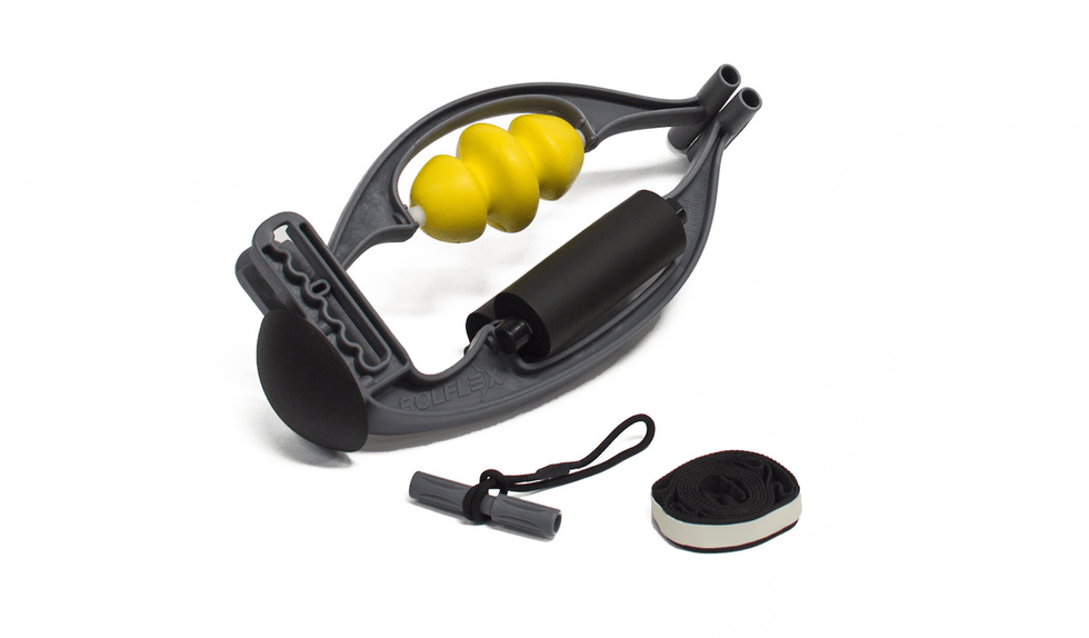 A circular contraption with yellow balls on one side and a foam roller on the other